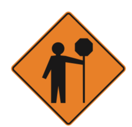 A diamond-shaped orange construction sign with a silhouette of a person digging.