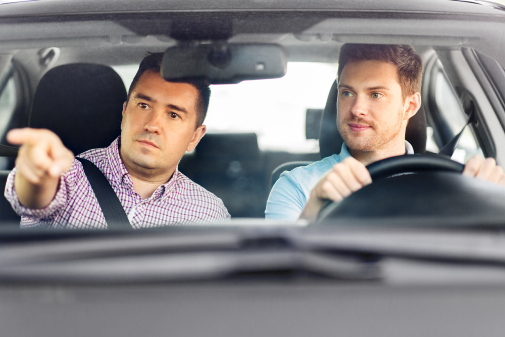 Male Instructor With Male Student Driver Valley Driving School